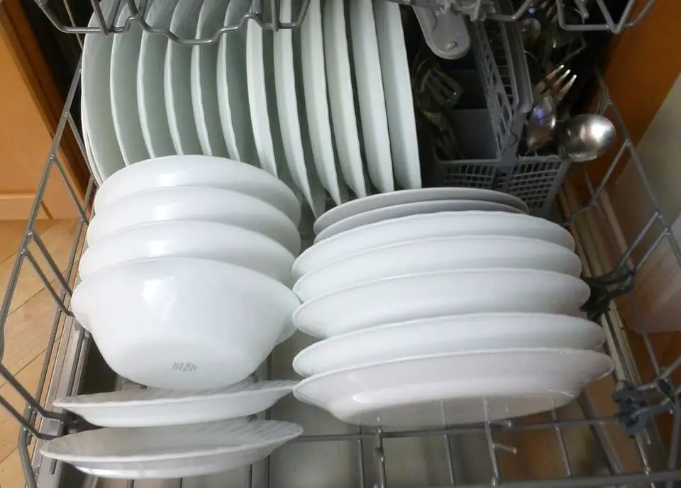 get rid of white film on dishes in dishwasher