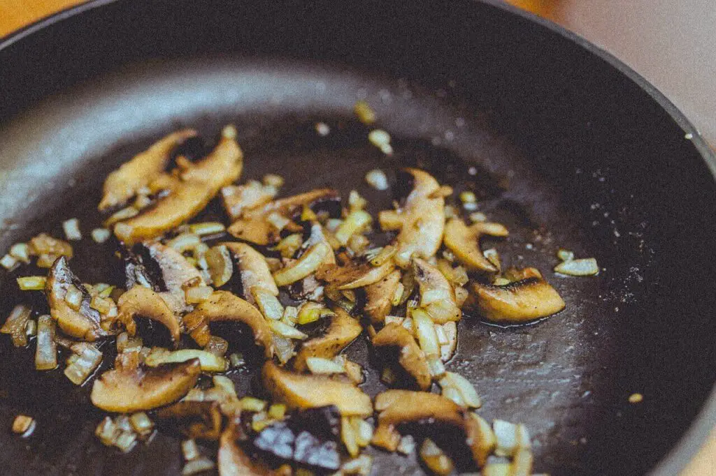 How to clean black residue off cast iron skillet